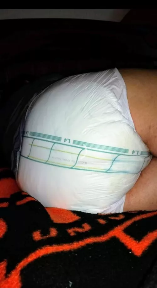 Watching my Alma Mater play football. Yes, I know, my butt is wet.