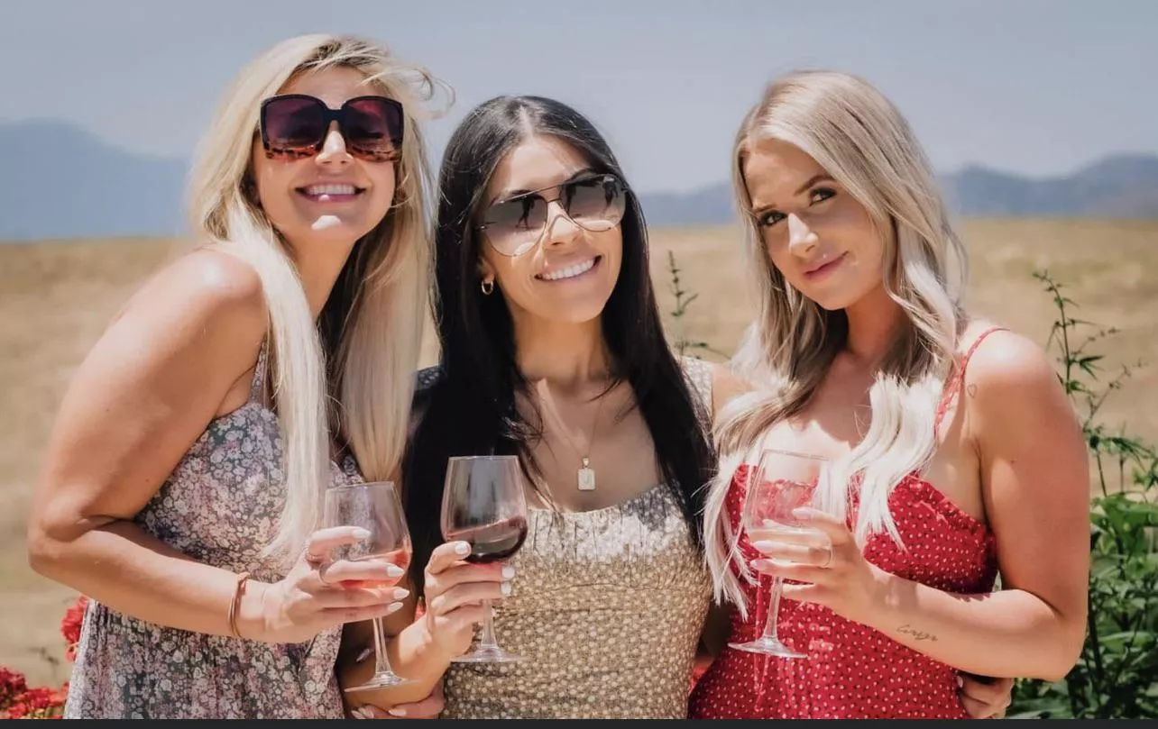 California girls enjoying wine