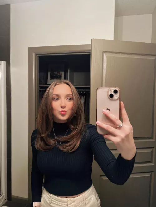 Form fitting sweaters are a vibe.