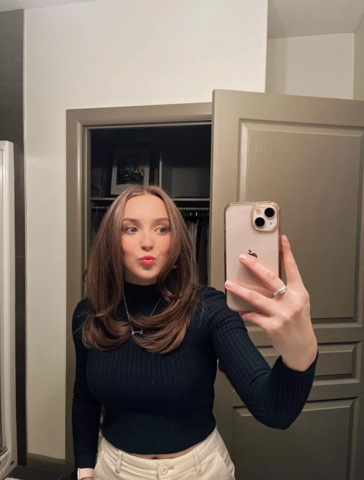 Form fitting sweaters are a vibe.