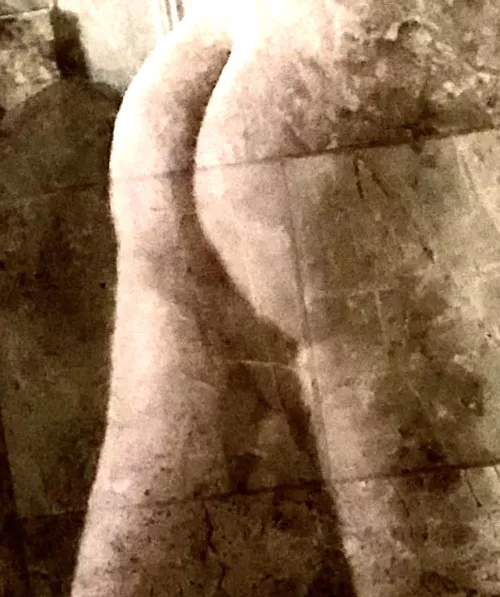 Bubble reflecting in the shower glass