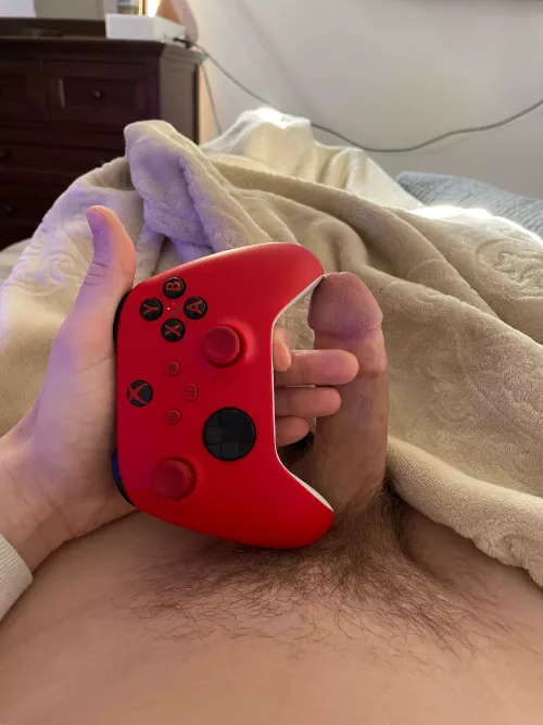 Next to an Xbox remote