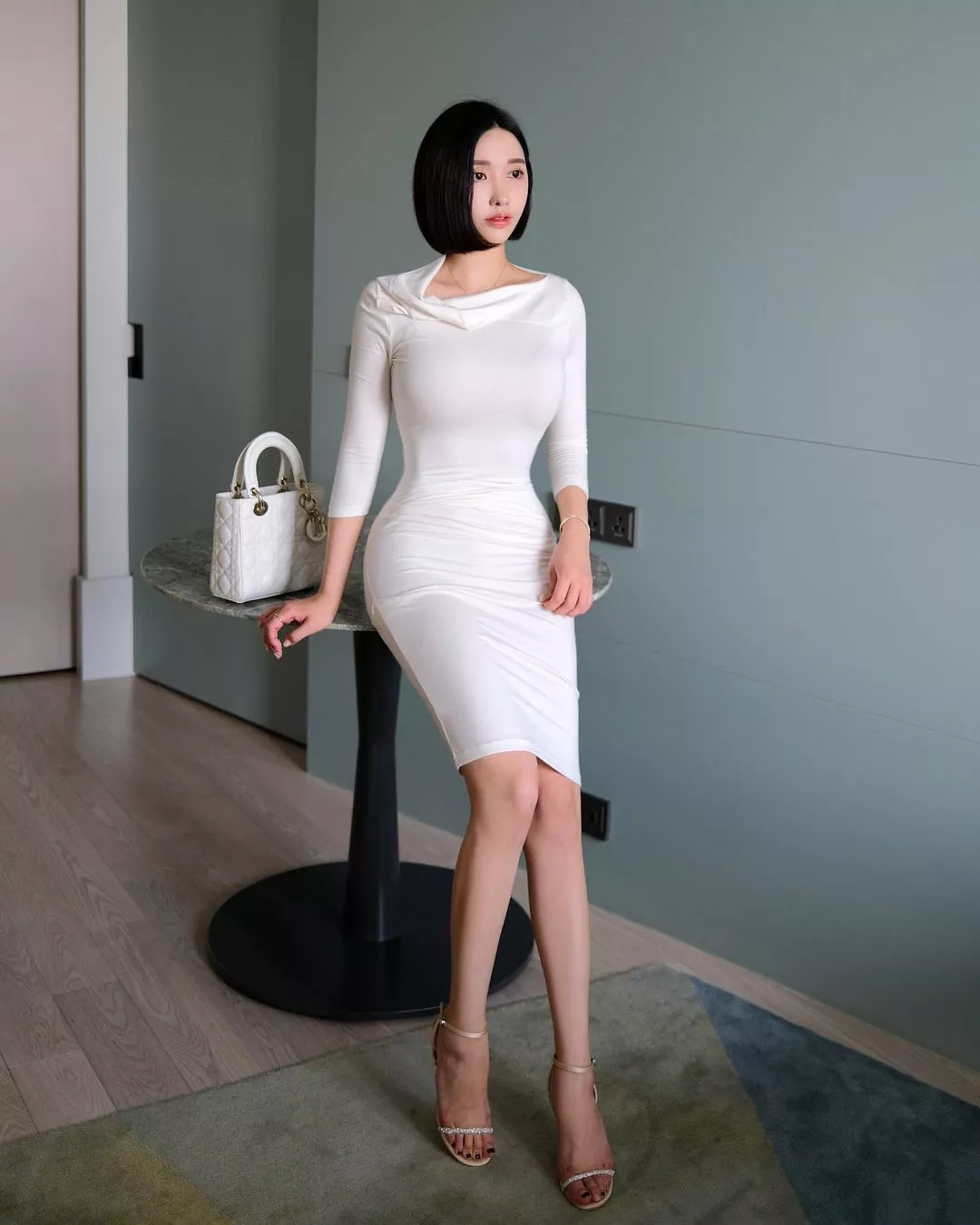 Tight white dress and heels