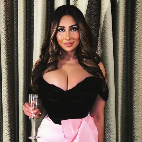 Bursting out of her corset