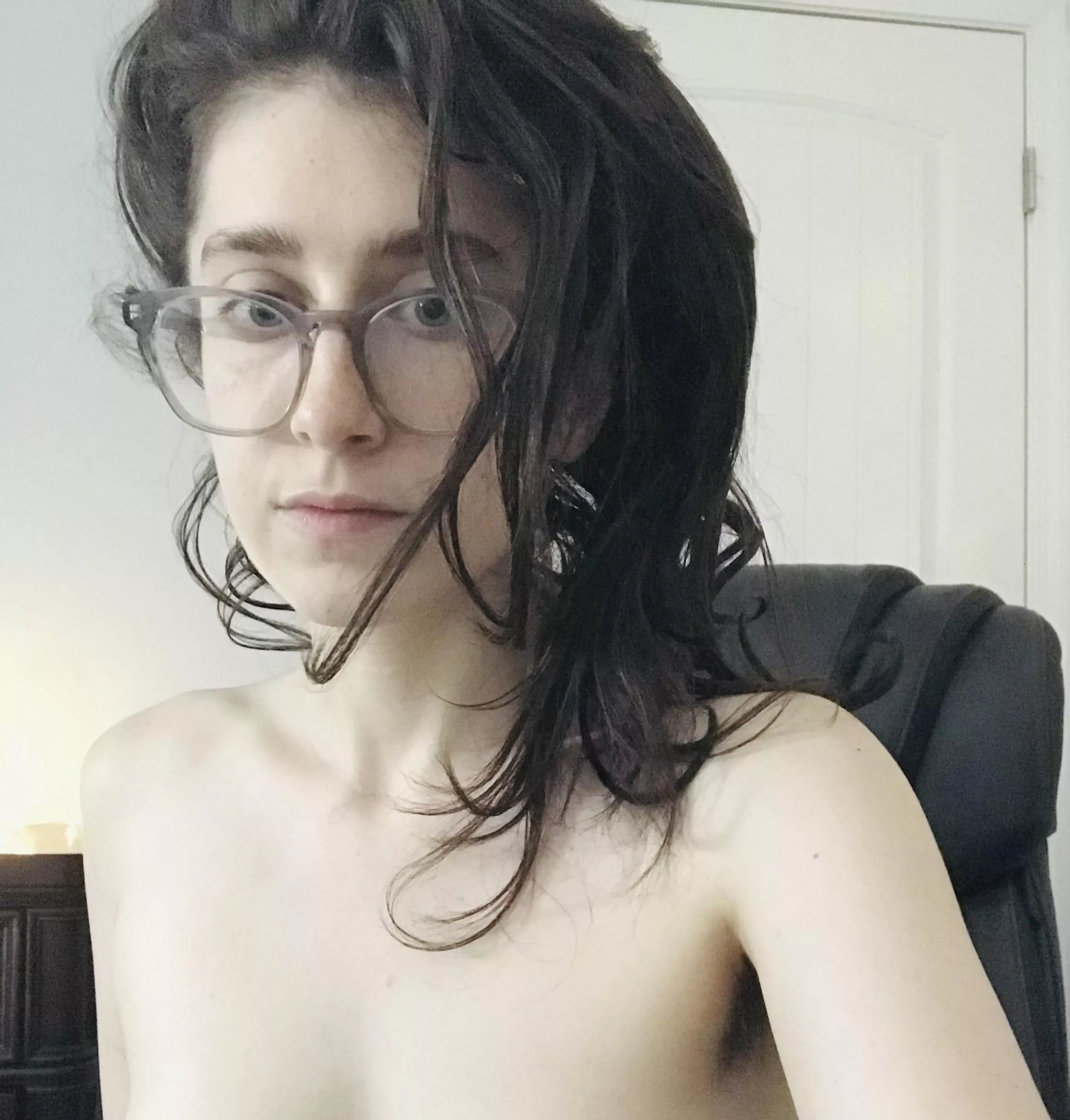 Nude girl with glasses in your office chair