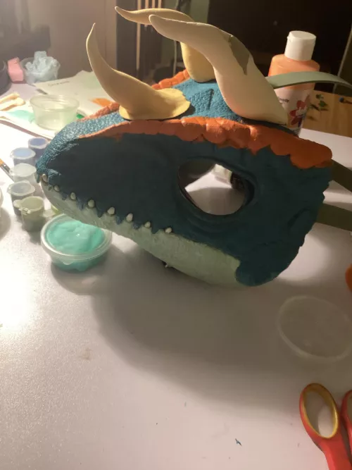 Working on a dinomask, where should I add horns?