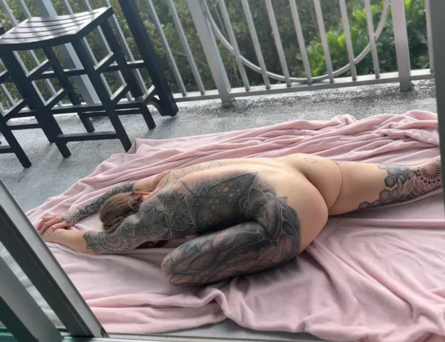 Doing some stretches on the balcony. I always wonder what my neighbors think