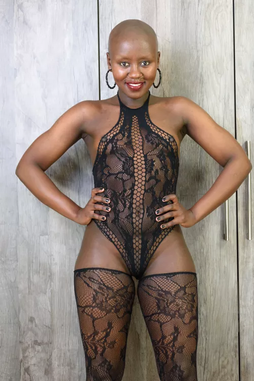 shaved bald doll in bodystocking