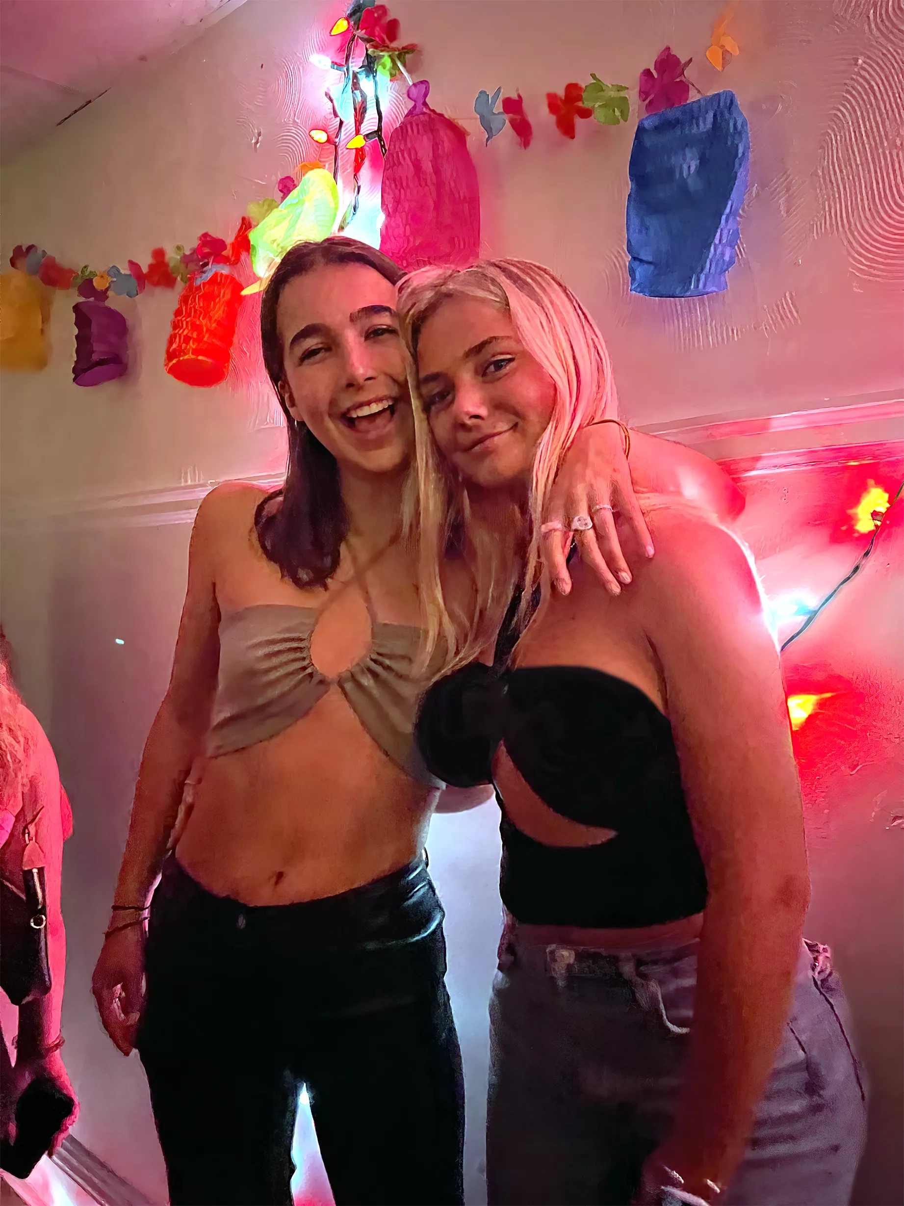 Pic is trash, but pretty bold of left to wear THAT outfit when her friend is at the same party