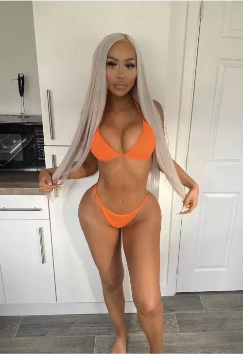 Surgically enhanced doll