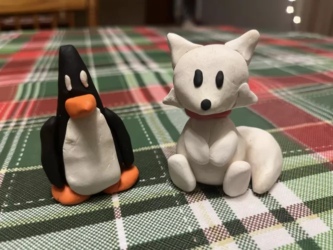 Made a clay penguin and husky!