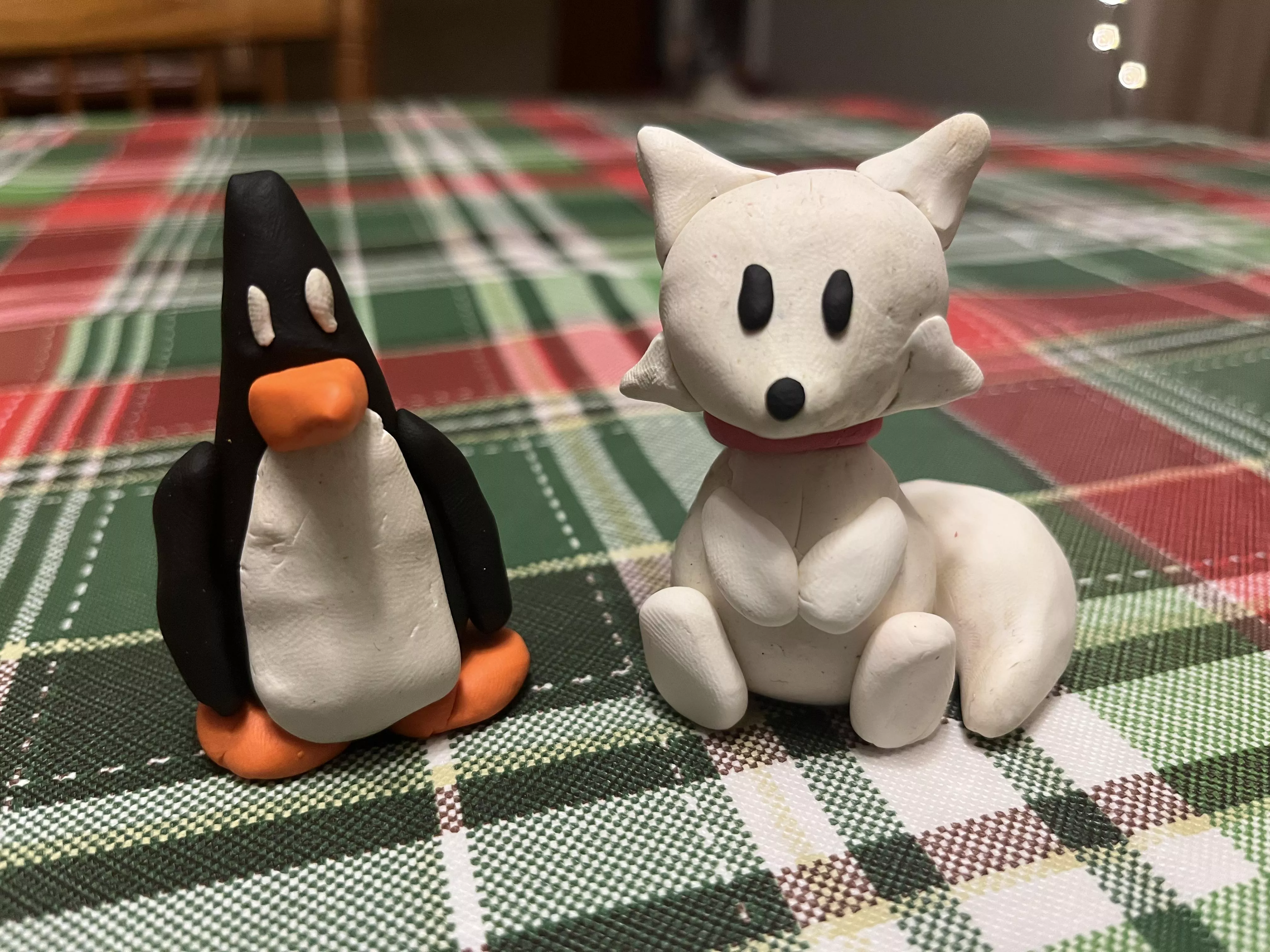 Made a clay penguin and husky!