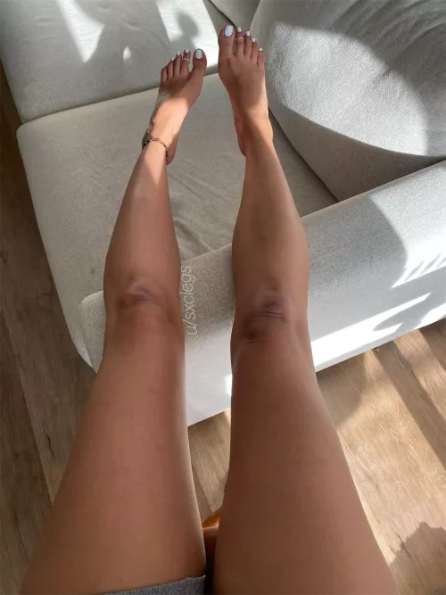 Tanned, slender legs
