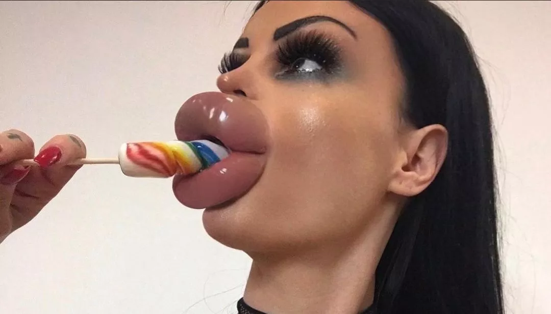 Her big fat fake lips are so perfect