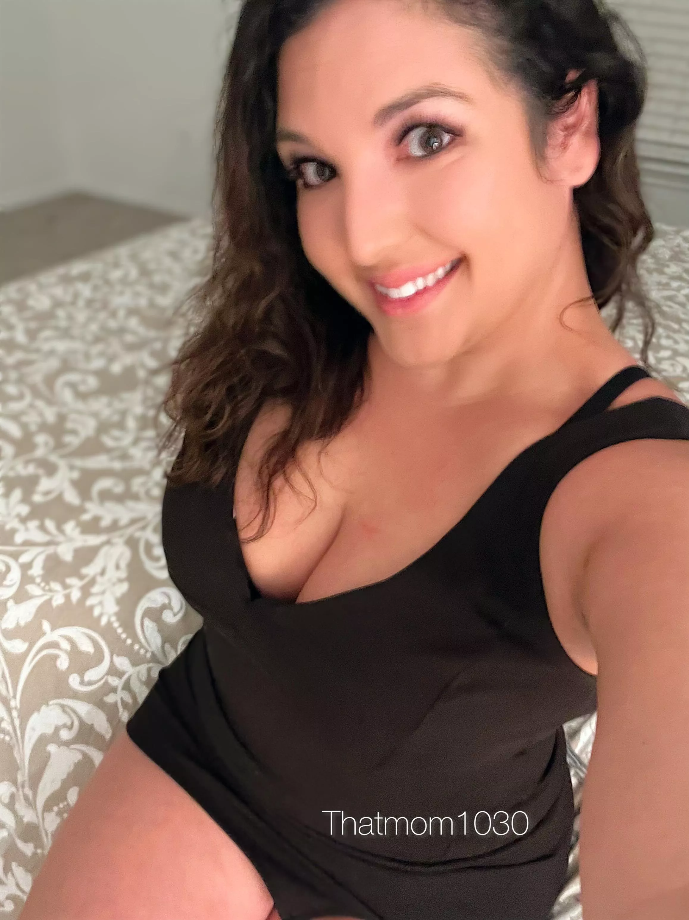 Just a regular milf in a tight black dress. Hope this gets you going.