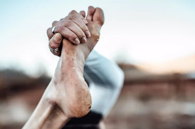 Yogi feet got a little dirty doing a yoga pose outdoors