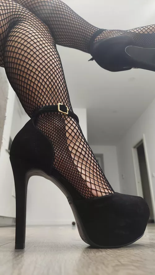 Heels and fishnet stockings