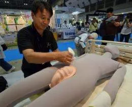 Japan firms showcase personal toilet-bidet devices (Update)