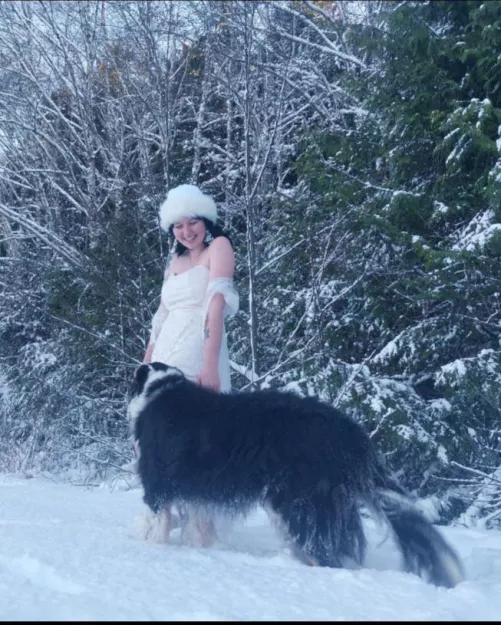 My dog photobombed my white dress in the snow pictures and made them better :)