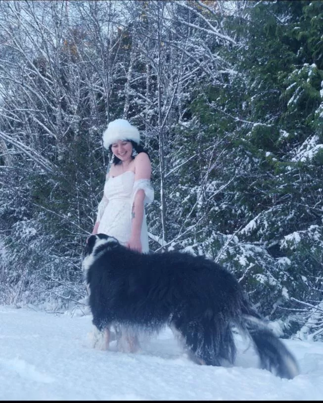 My dog photobombed my white dress in the snow pictures and made them better :)