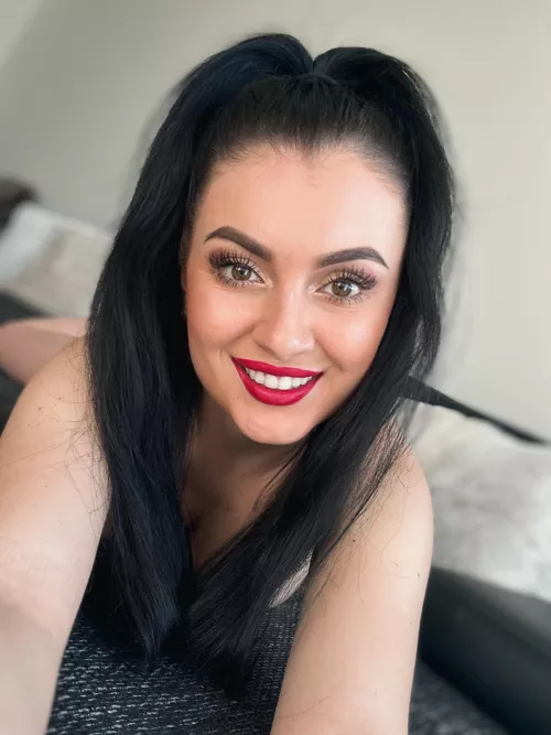 Naky on the sofa, smiling at you 🥰