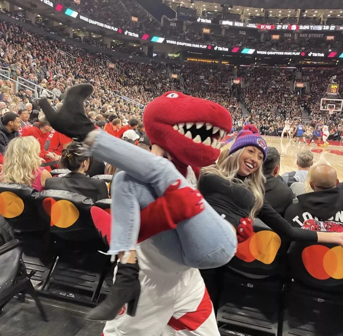 Busty blonde at raptor game