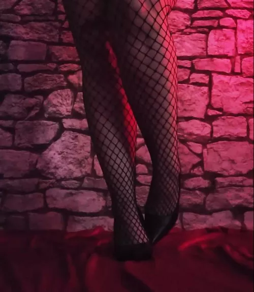 Love this stiletto and fishnet combo