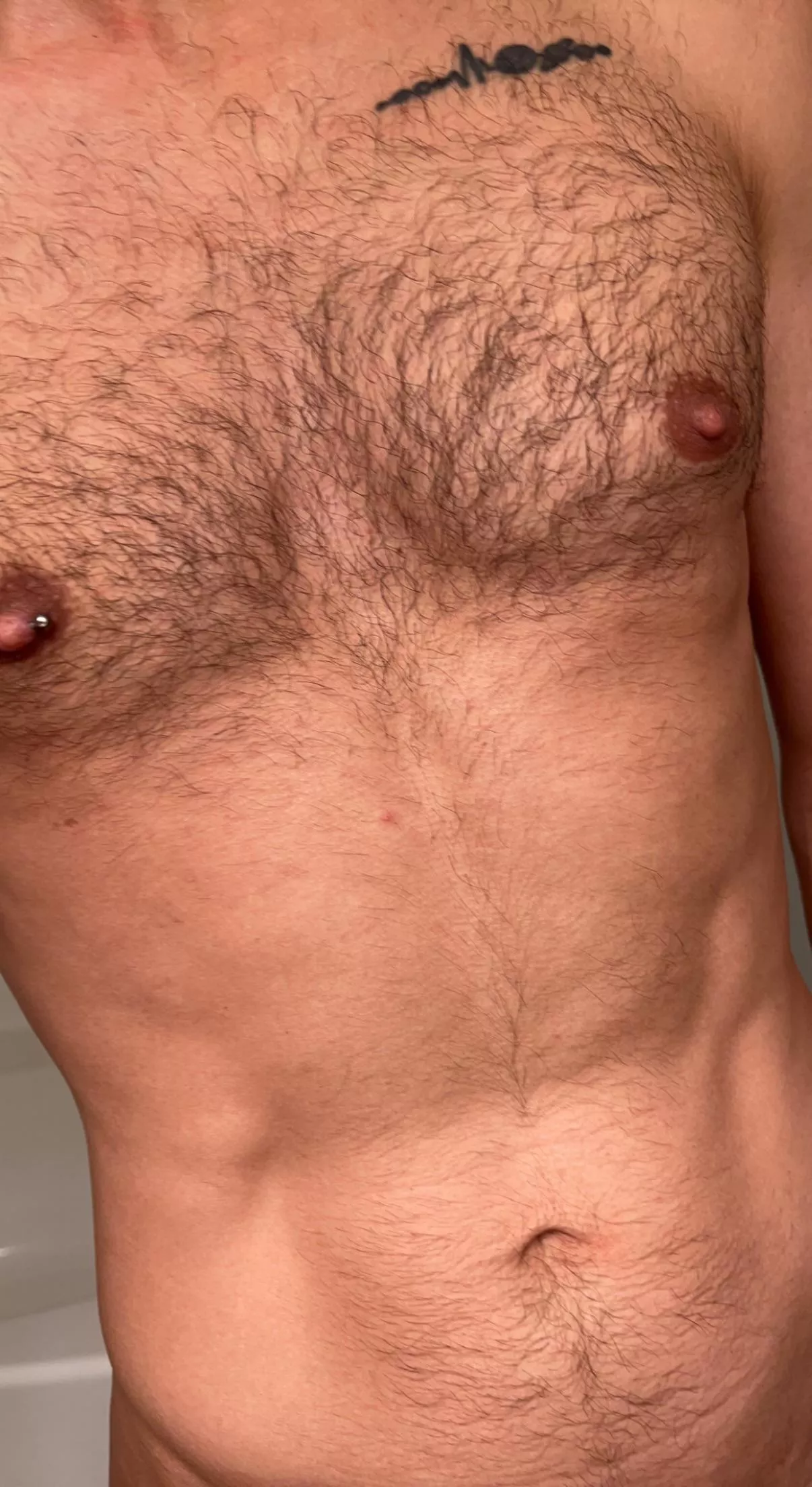 Should I continue growing out my chest or give it a little trim?