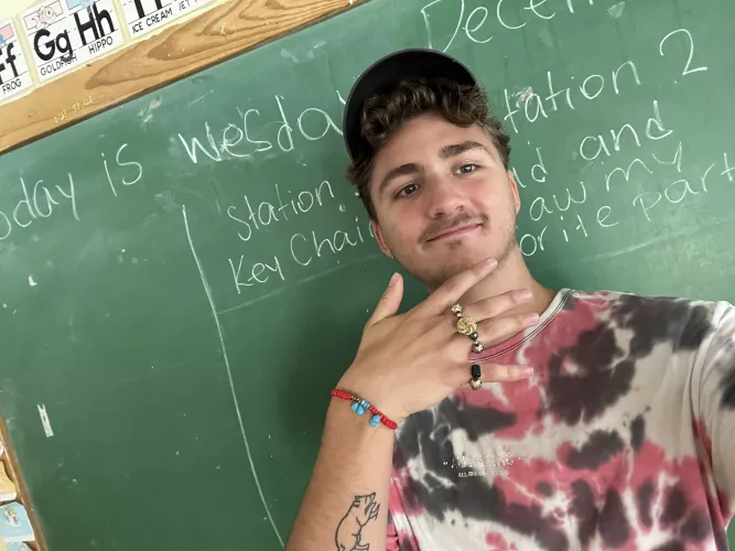 Celebrating my bday wearing the bling the kids I teach made for me