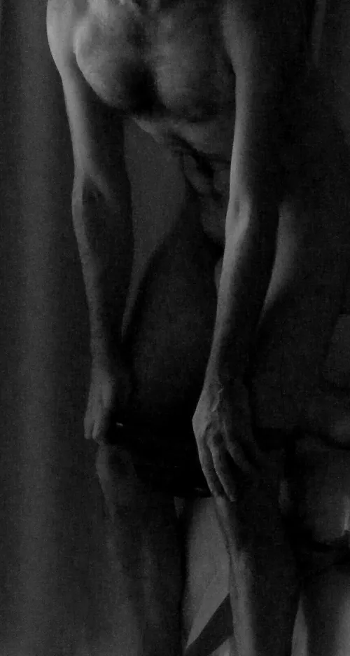 This is barely NSFW, but you can just see my dick peaking through. There is plenty on my profile that is unambiguously NSFW......