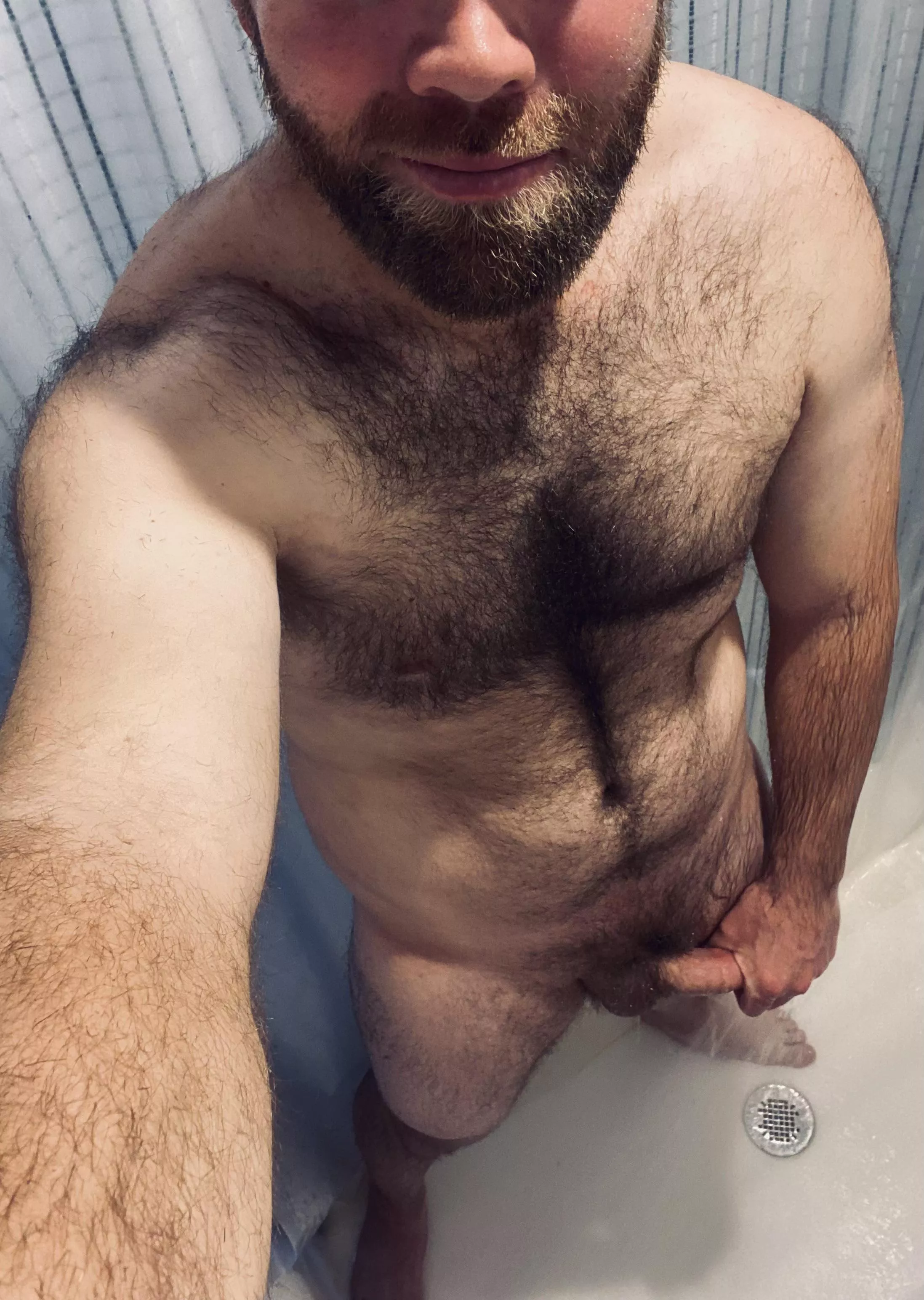 Fun fact, there are two shower heads in here…who wants to join this 6’5” dadbod?
