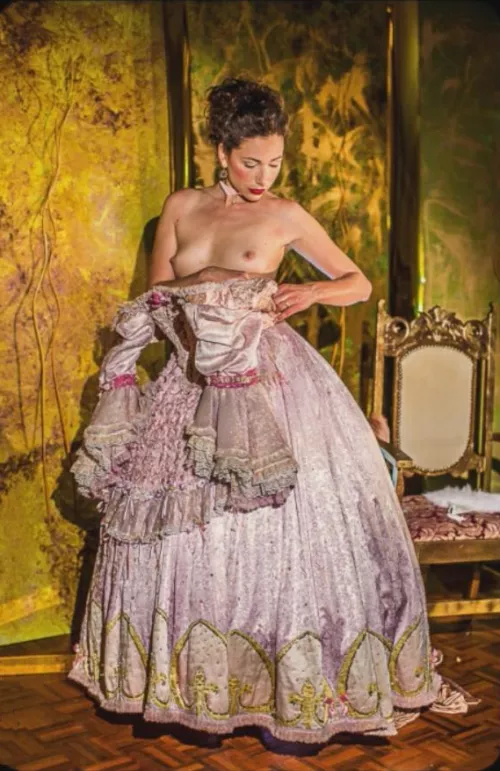 Removing her ballgown