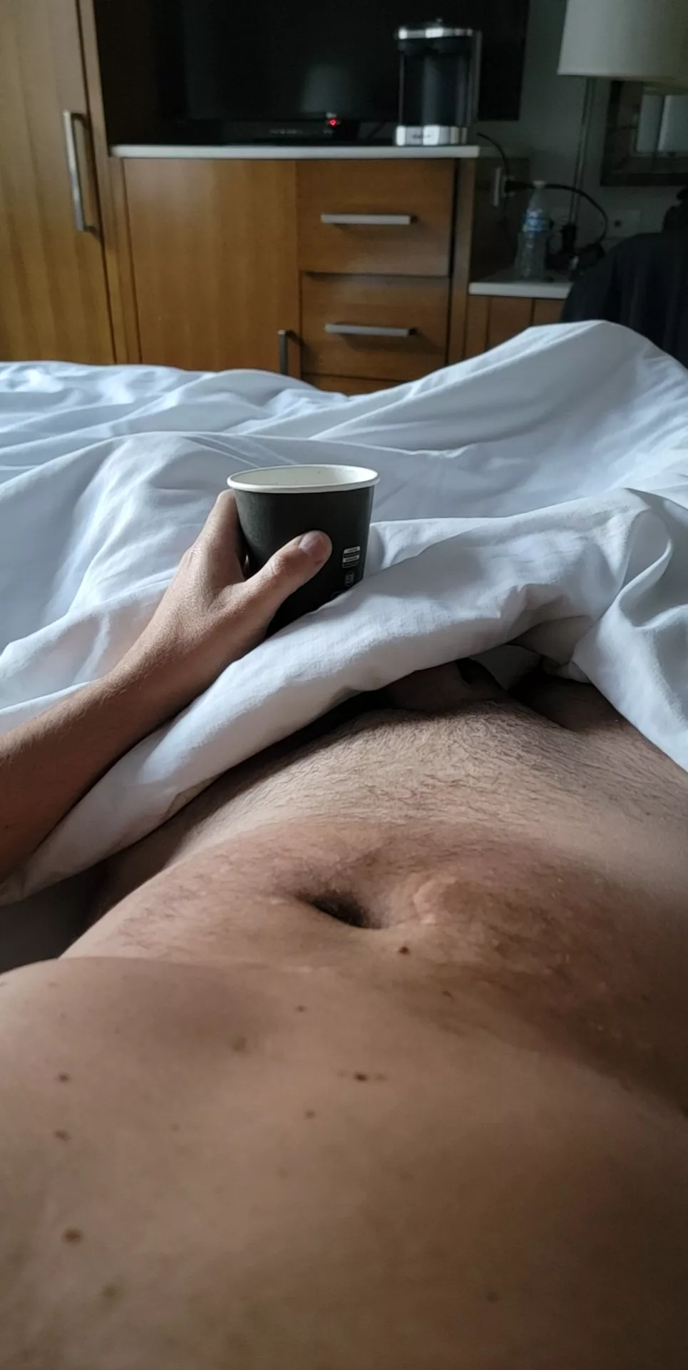 The hotel coffee is terrible, but at least I don't have clothes on