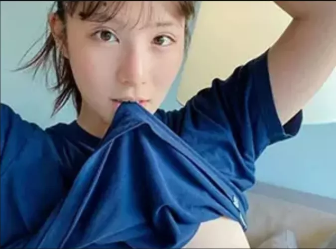 Who is she ? Is she an AV actress (pic found in an ad)