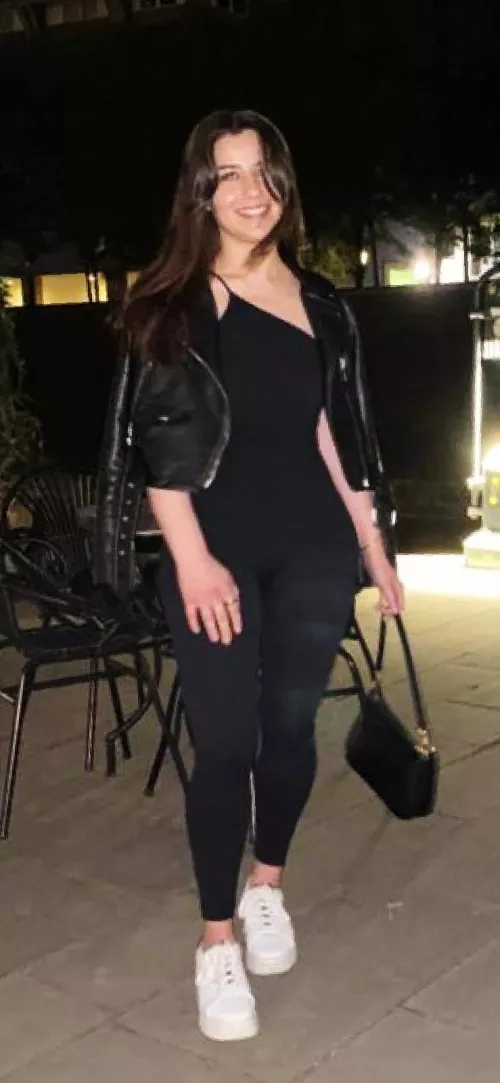 In a jumpsuit leggings