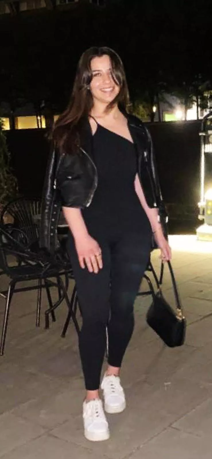 In a jumpsuit leggings