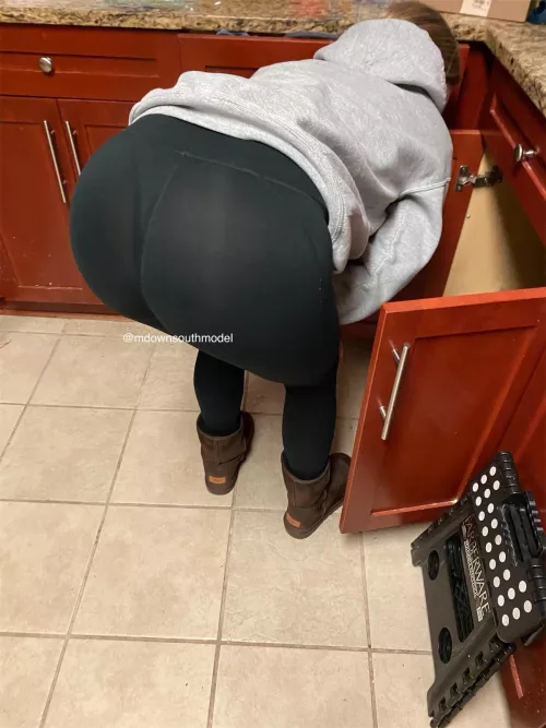 Just a hint of a green thong as a search for my Tupperware.