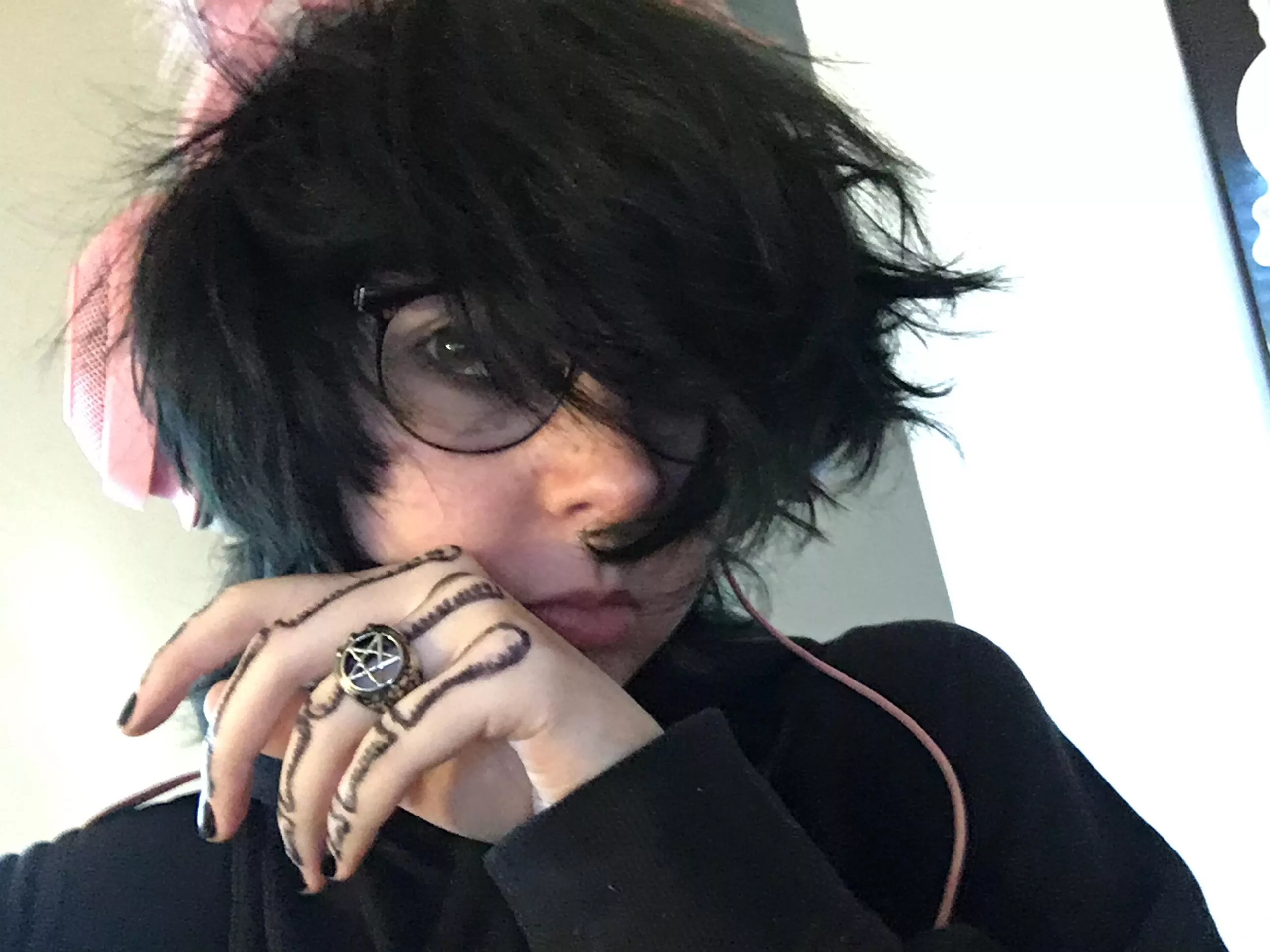 When your trying to look all scary but you still wear pink cat ear headphones.