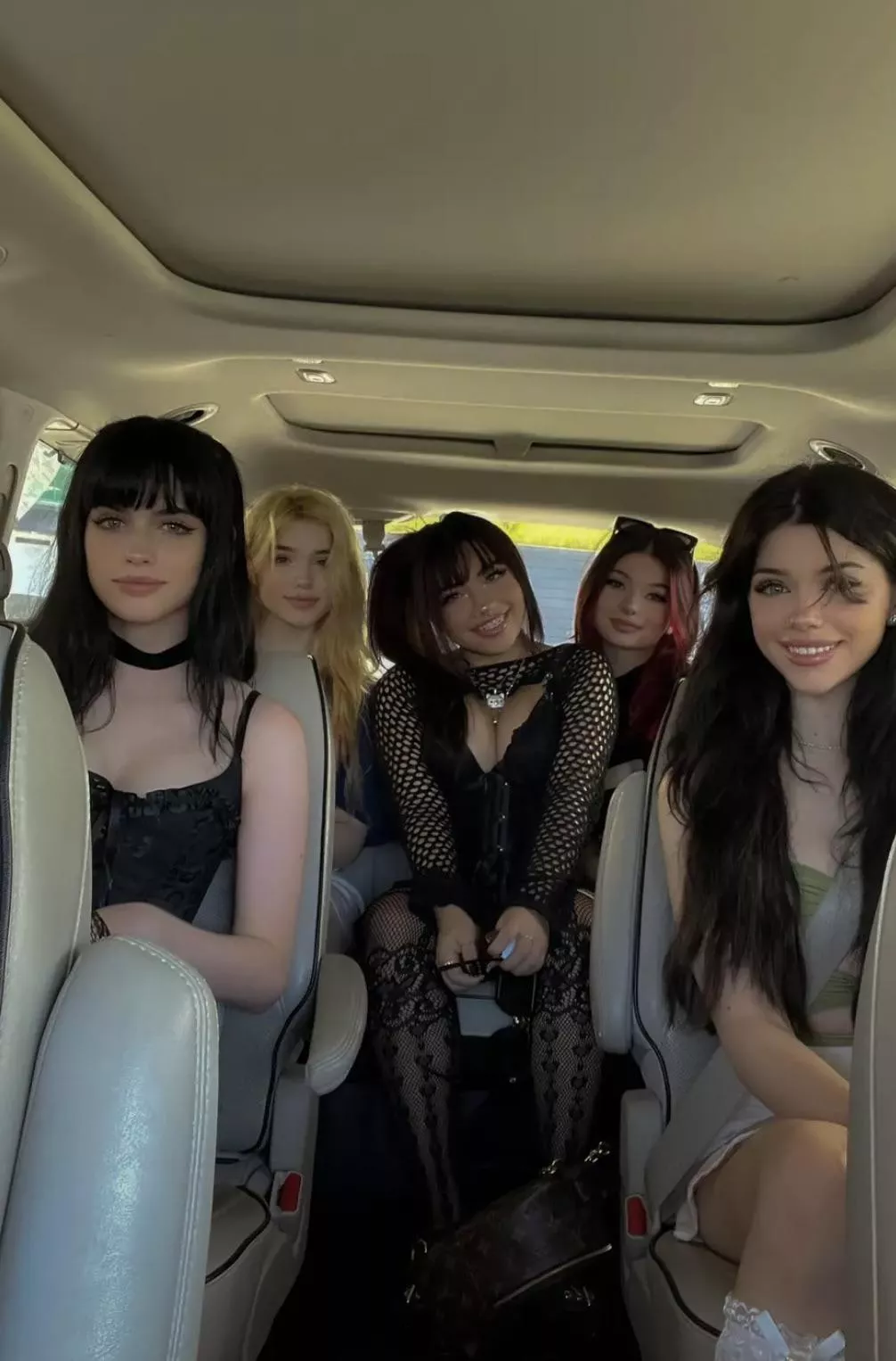 Help a man out, who’s the one in the middle wearing black