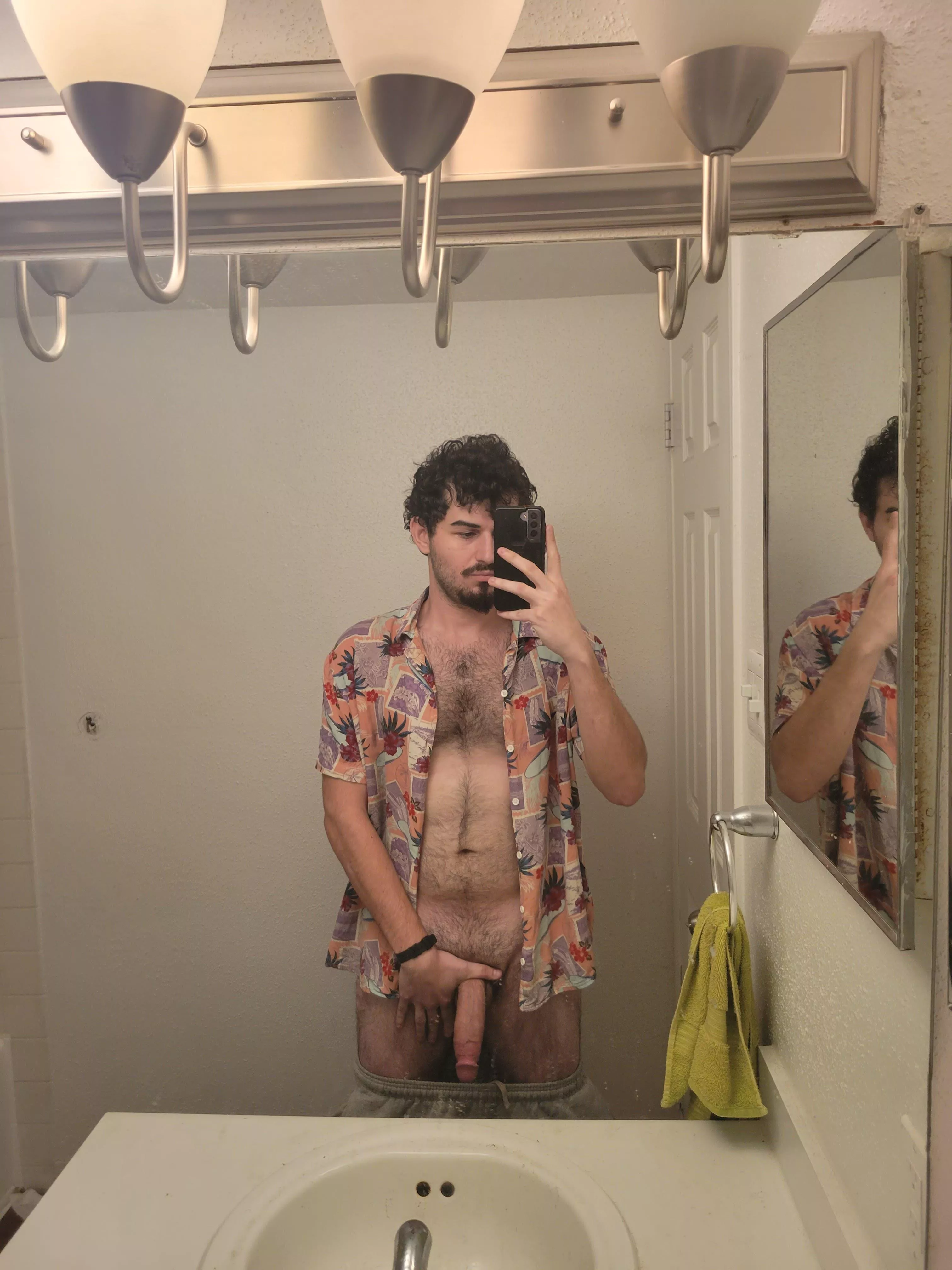 Nothing goes together better than chest hair and Hawaiian shirts