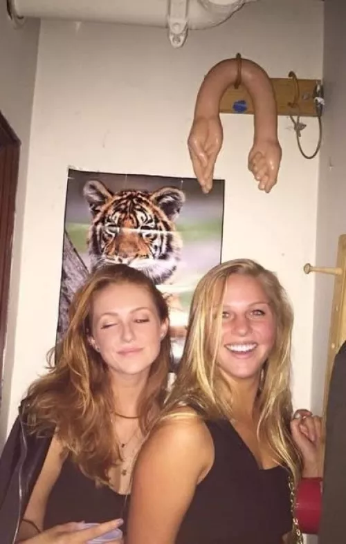 College girls posing with their trophy