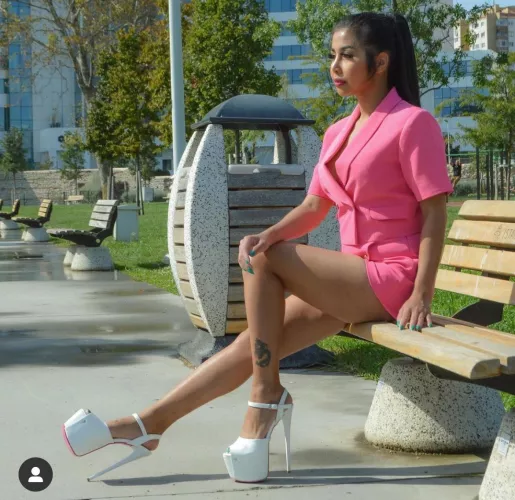 Enjoy the sun on a bank in a park.