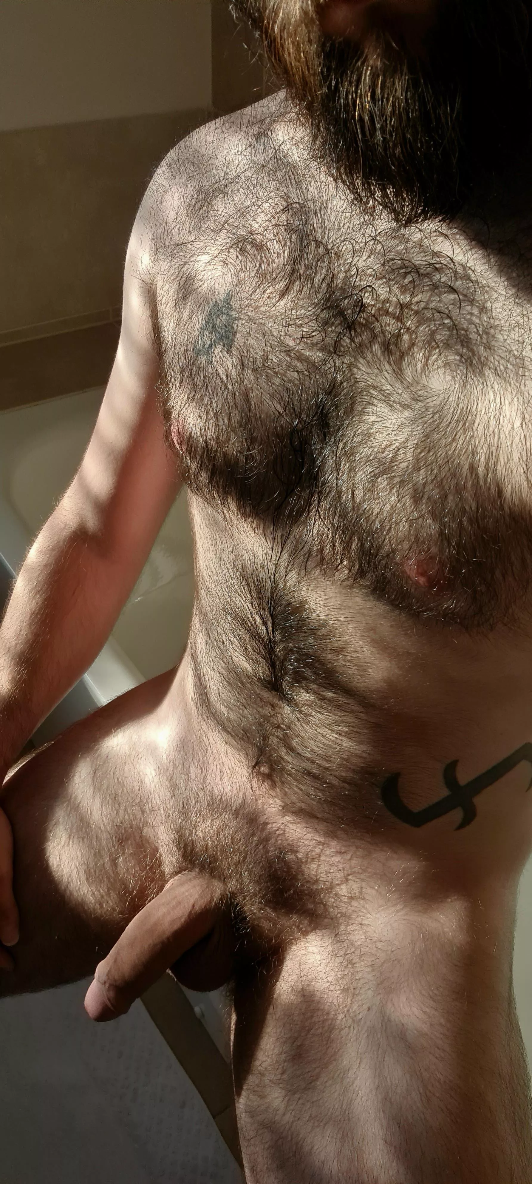 Sun kissed chest hair.