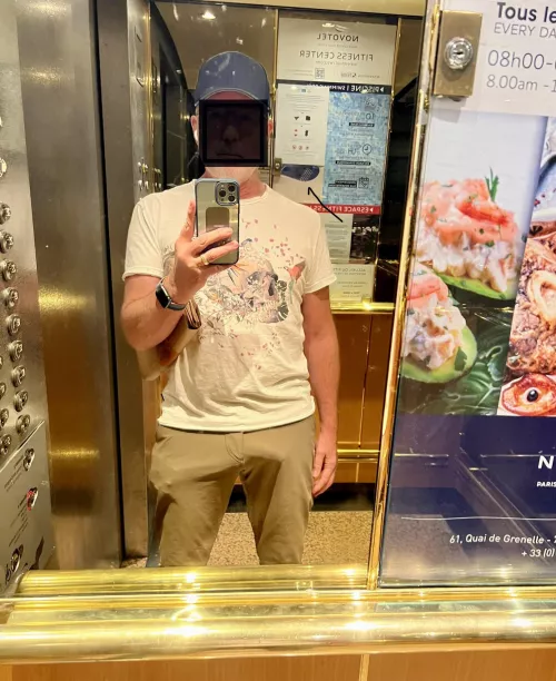 Hotel elevator, headed out shopping in Paris