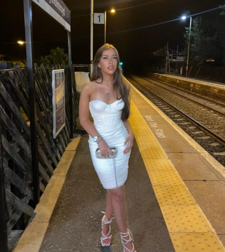 Leah waiting for her train