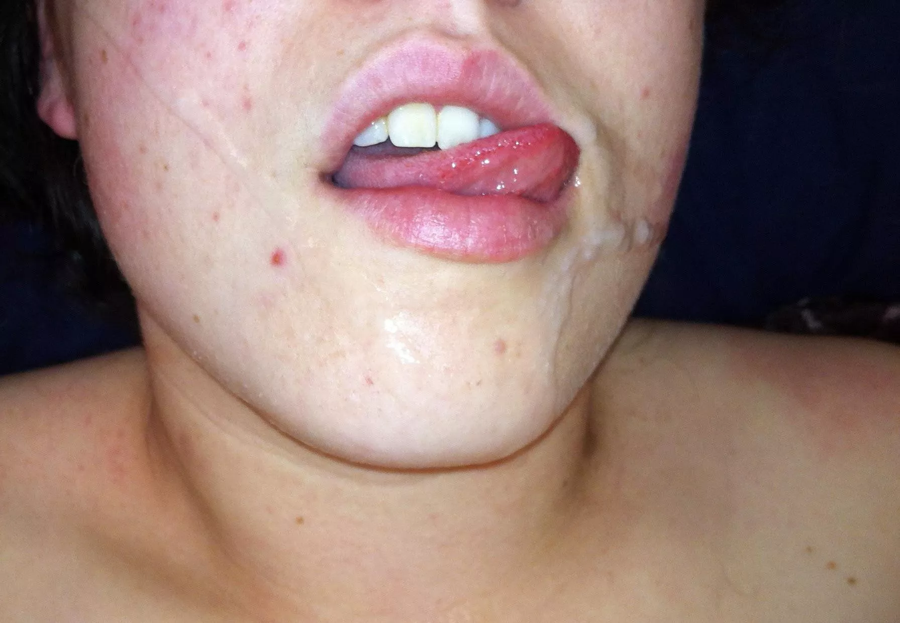 My gorgeous wife licking up the cum