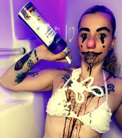 Just a Clowngirl playing with cream, sauce and sprinkles.