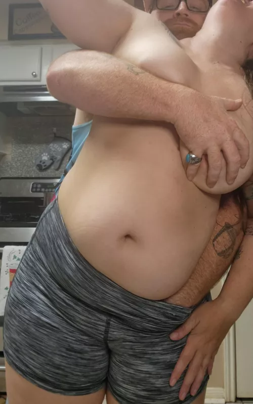 Mommy and Daddy are getting freaky in the kitchen.
