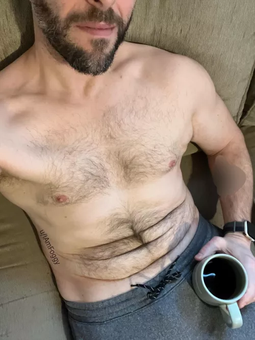 The coffee may be hot but the thoughts behind the grin are hotter..