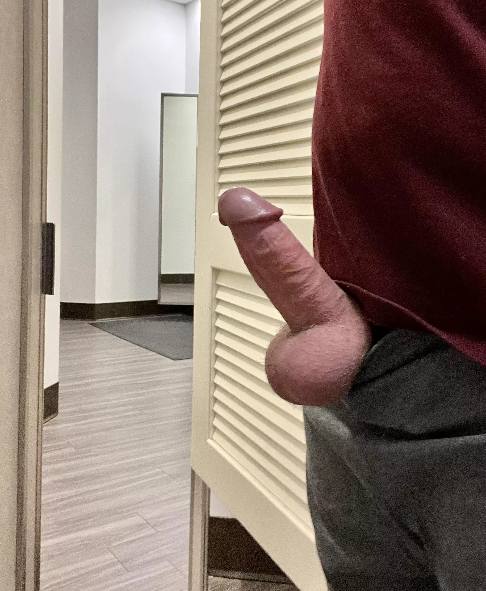 Tryin on new sweats with dressing room open.